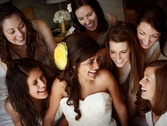 Happy bridesmaids laughing together