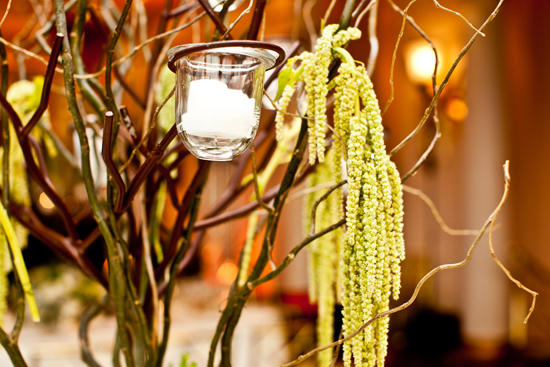 Rustic candleholder arrangement with flowers