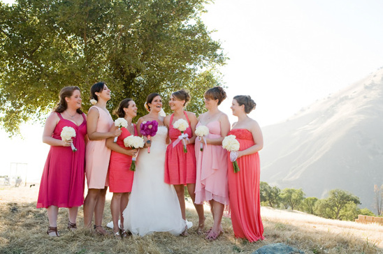 Wedding party in coral and peach dresses