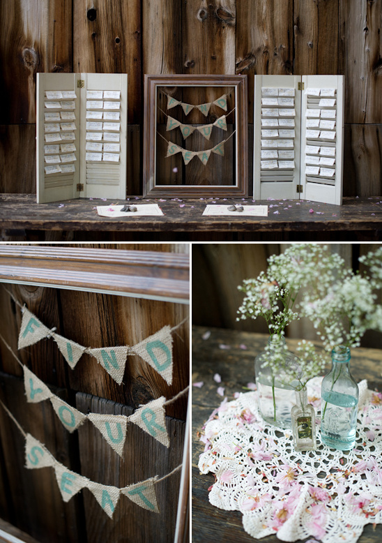 Rustic wedding place cards and burlap banner display