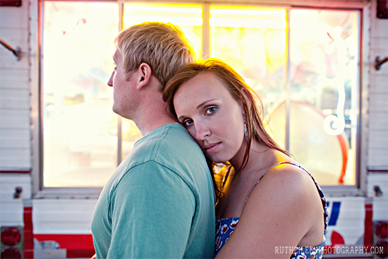 Affectionate woman embraces her partner lovingly outdoors