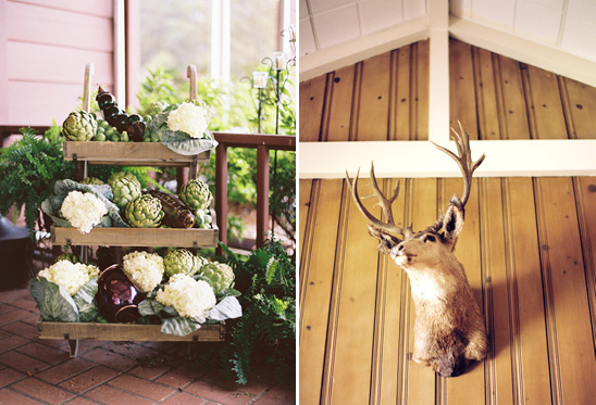 Rustic wedding decor: artichokes, hydrangeas, deer head