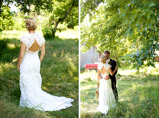 Bride and groom embrace outdoors in wedding attire