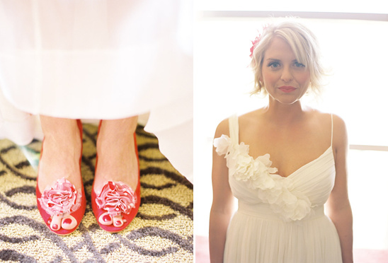 Bride wearing red flats and a floral gown