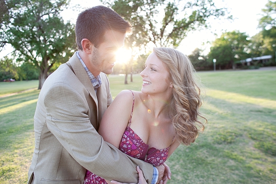 Couple embraces park sunlight love