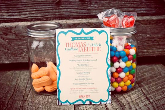 Wedding favor jars with candy and program
