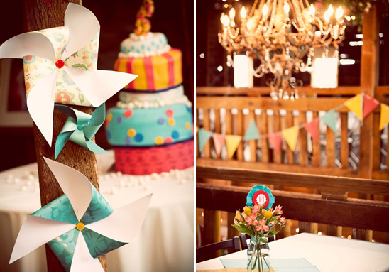 Colorful cake and pinwheels at a rustic wedding