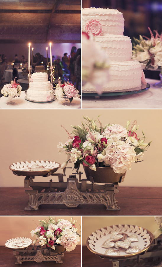 Vintage wedding decor with cake flowers and scales