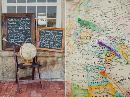 Travel themed wedding decor guest list and map for seating