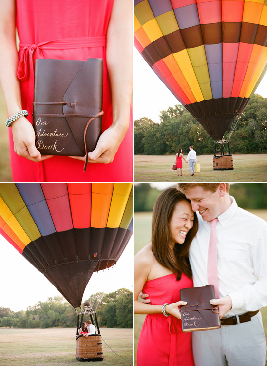 Couple with adventure book and colorful hot air balloon
