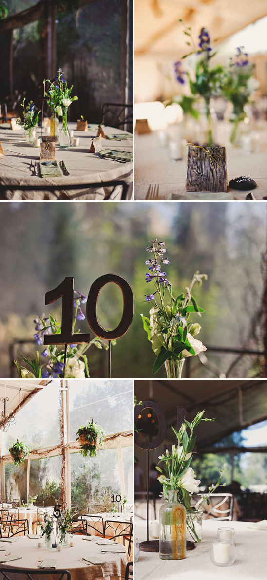 Rustic wedding table decor with floral centerpieces and numbers