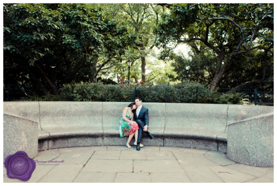 Couple in love, sitting on a bench in a beautiful park