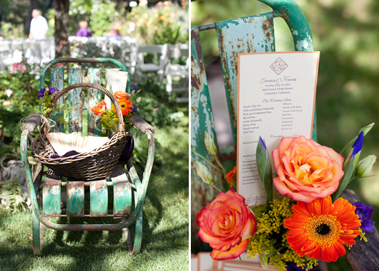 Rustic wedding chair decorated with flowers and a basket of fans