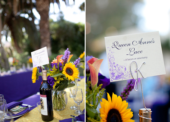 Elegant table setting with flowers and a wine bottle centerpiece