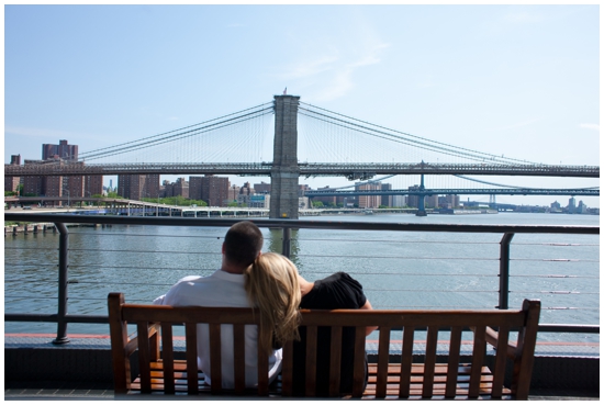 Couple enjoying the view of Brooklyn Bridge in New York City
