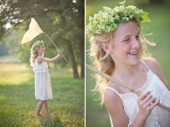 Smiling girl with flower crown playing in a green field with a net