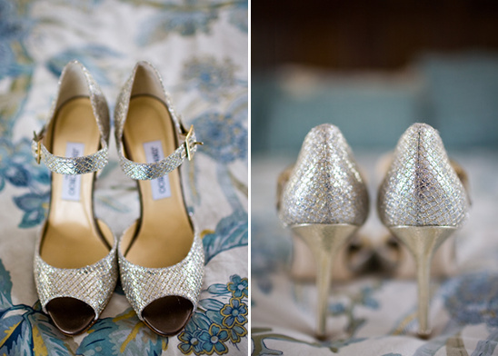 Sparkling silver Jimmy Choo wedding shoes on floral bed