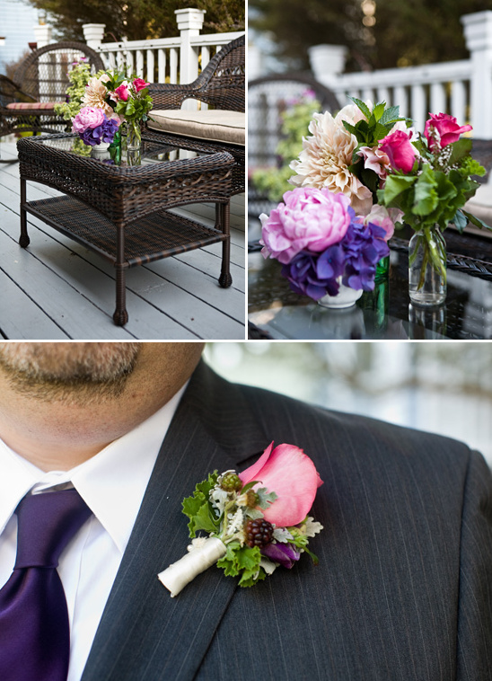 Wedding decor featuring flowers, table settings, and groom's boutonniere