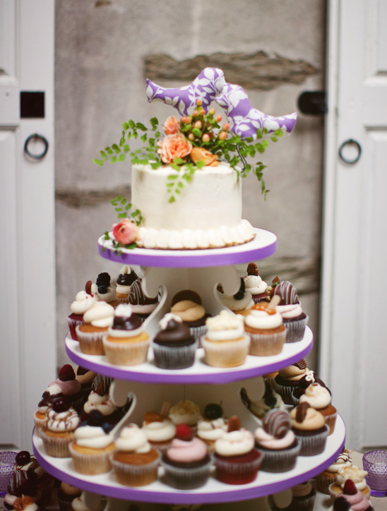 Elegant wedding cake and cupcake tower decorated beautifully