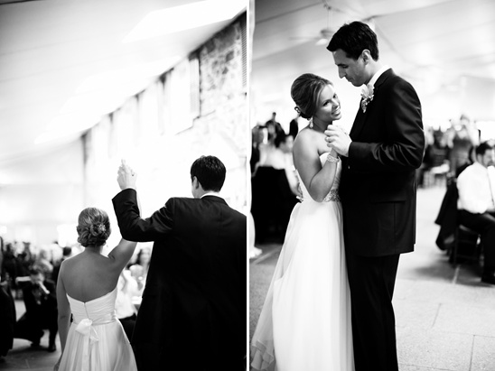 Elegant wedding couple dancing at their reception, black and white photo