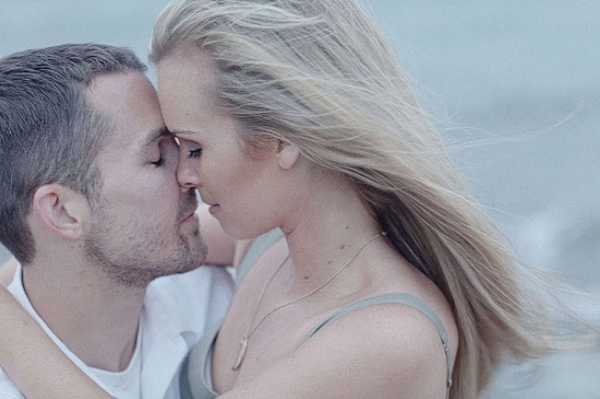 Couple embracing in a tender moment, sharing a loving connection