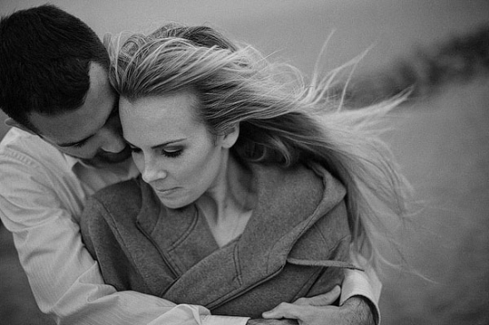 Couple in love embrace, black and white, romantic portrait