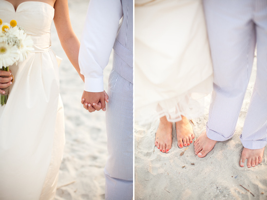 Beach wedding with couple holding hands walking barefoot in sand