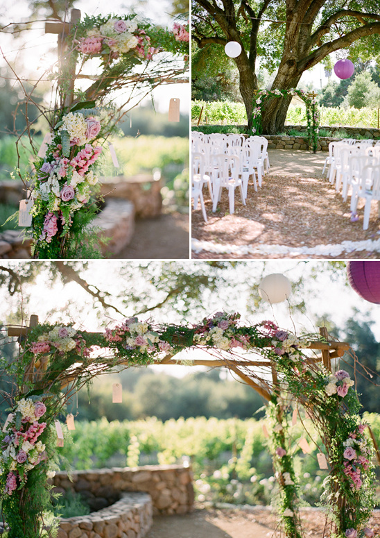 Wedding ceremony with floral arch and seating arrangement
