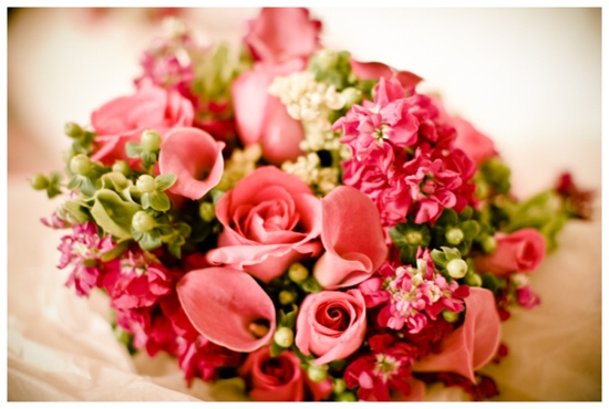 Beautiful pink rose and calla lily wedding bouquet arrangement