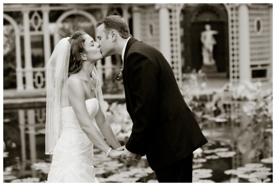 Bride and groom share a tender kiss on their wedding day
