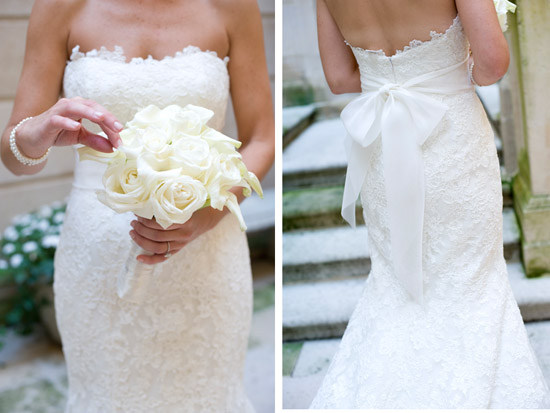 Bride in white lace wedding dress with flower bouquet