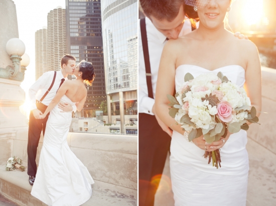 Wedding couple kissing with bouquet in city background