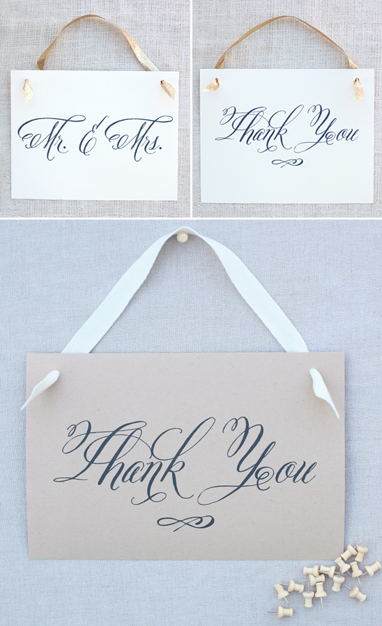 Calligraphy signs saying Mr and Mrs and Thank You hanging