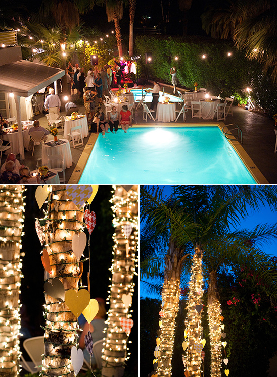 Nighttime outdoor wedding with string lights and pool