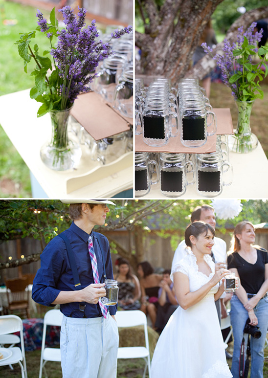 Outdoor wedding with mason jars, flowers and wedding guests