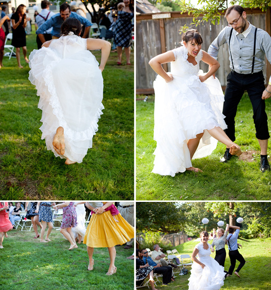 Wedding guests joyfully dancing barefoot on the lawn
