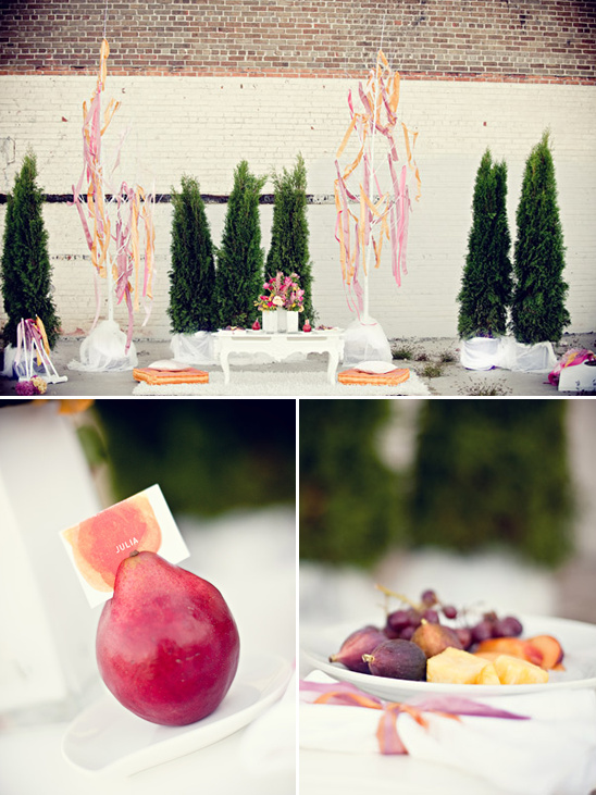 Elegant outdoor wedding decor with fruit and decorative accents