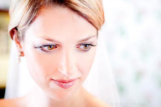 Bride gazing down with a soft smile, perfect wedding portrait shot