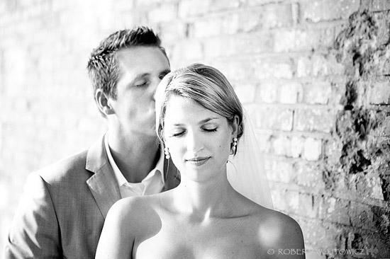 Bride and groom share a loving kiss on their wedding day