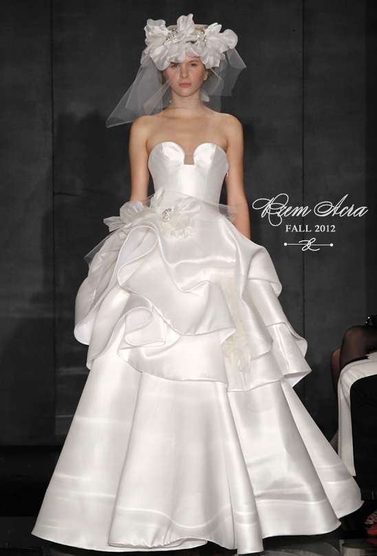 Elegant strapless white bridal gown with floral headpiece
