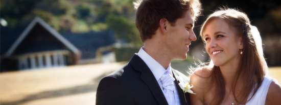 Happy couple looking at each other on their wedding day