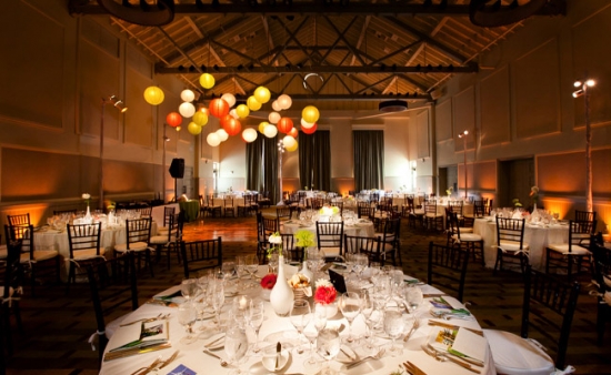 Elegant wedding reception hall with colorful paper lanterns