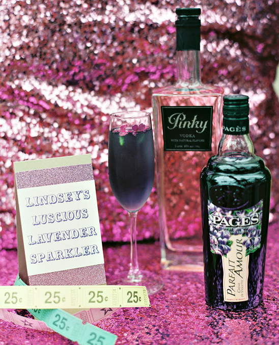 Lavender sparkler cocktails on pink sequins