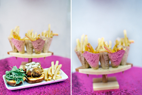 Gourmet burger and fries served on a tiered display