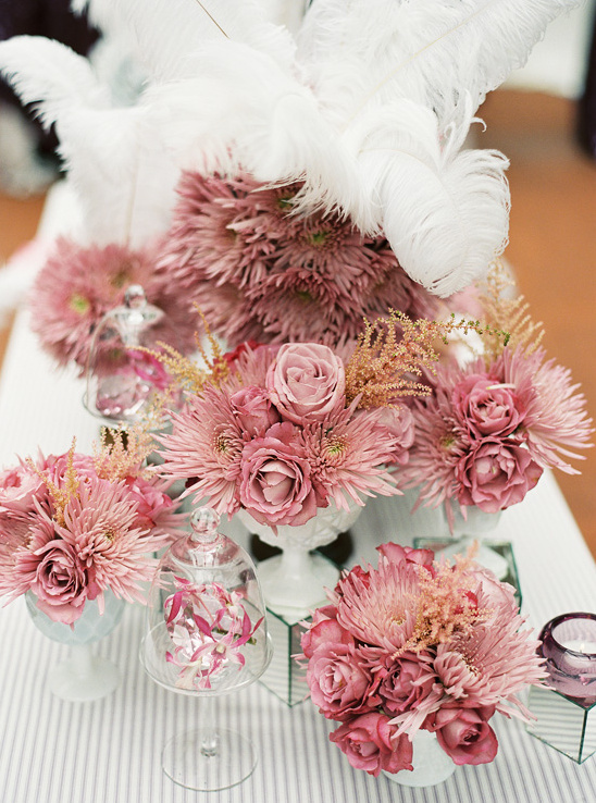 Elegant pink rose and feather centerpieces display