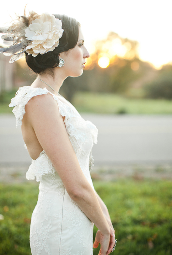 Bride in vintage lace gown and floral headpiece
