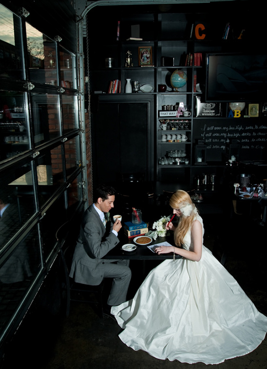 Bride and groom enjoy coffee at cafe