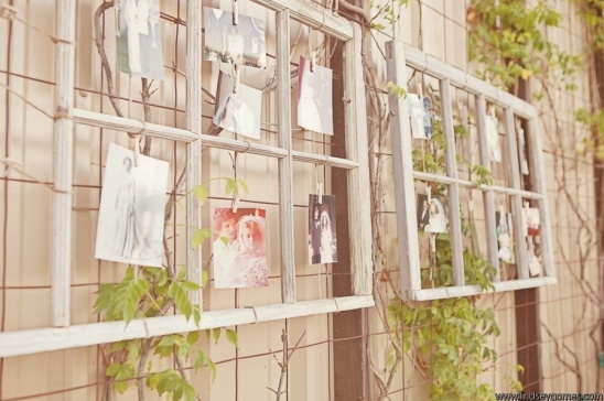 Vintage wedding photos displayed on old window frames
