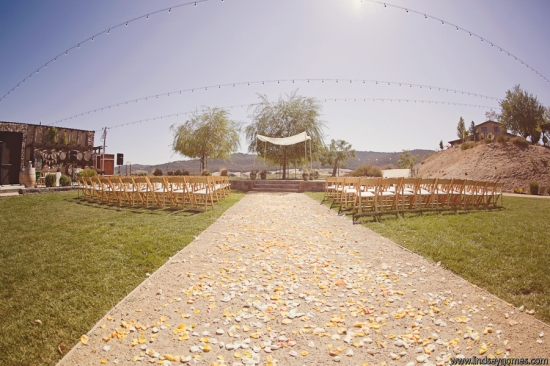 Outdoor wedding ceremony setting with chairs