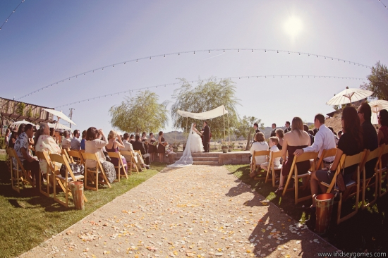 Outdoor wedding ceremony with guests and bride groom